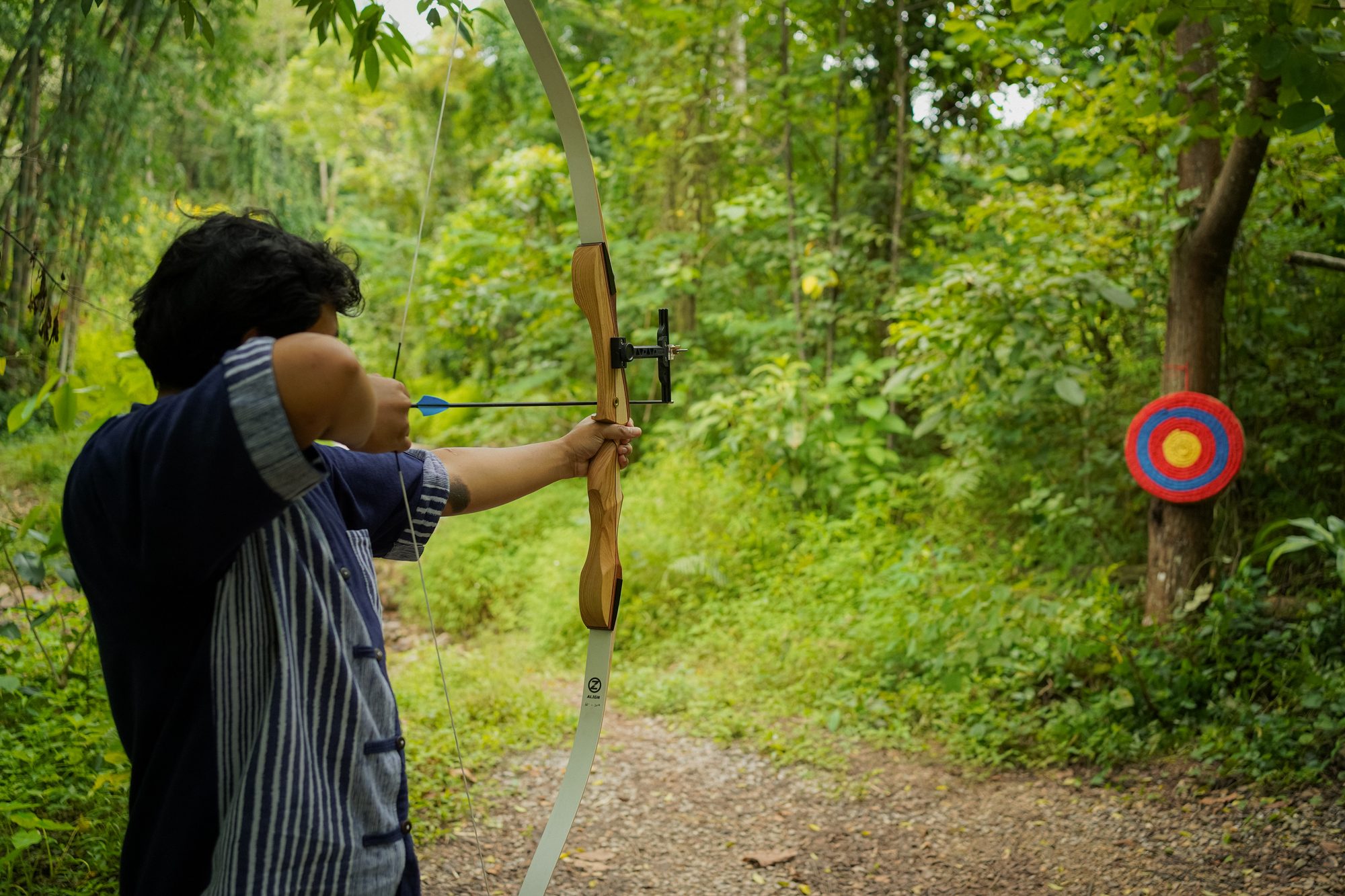 Archery among the trees near the camp