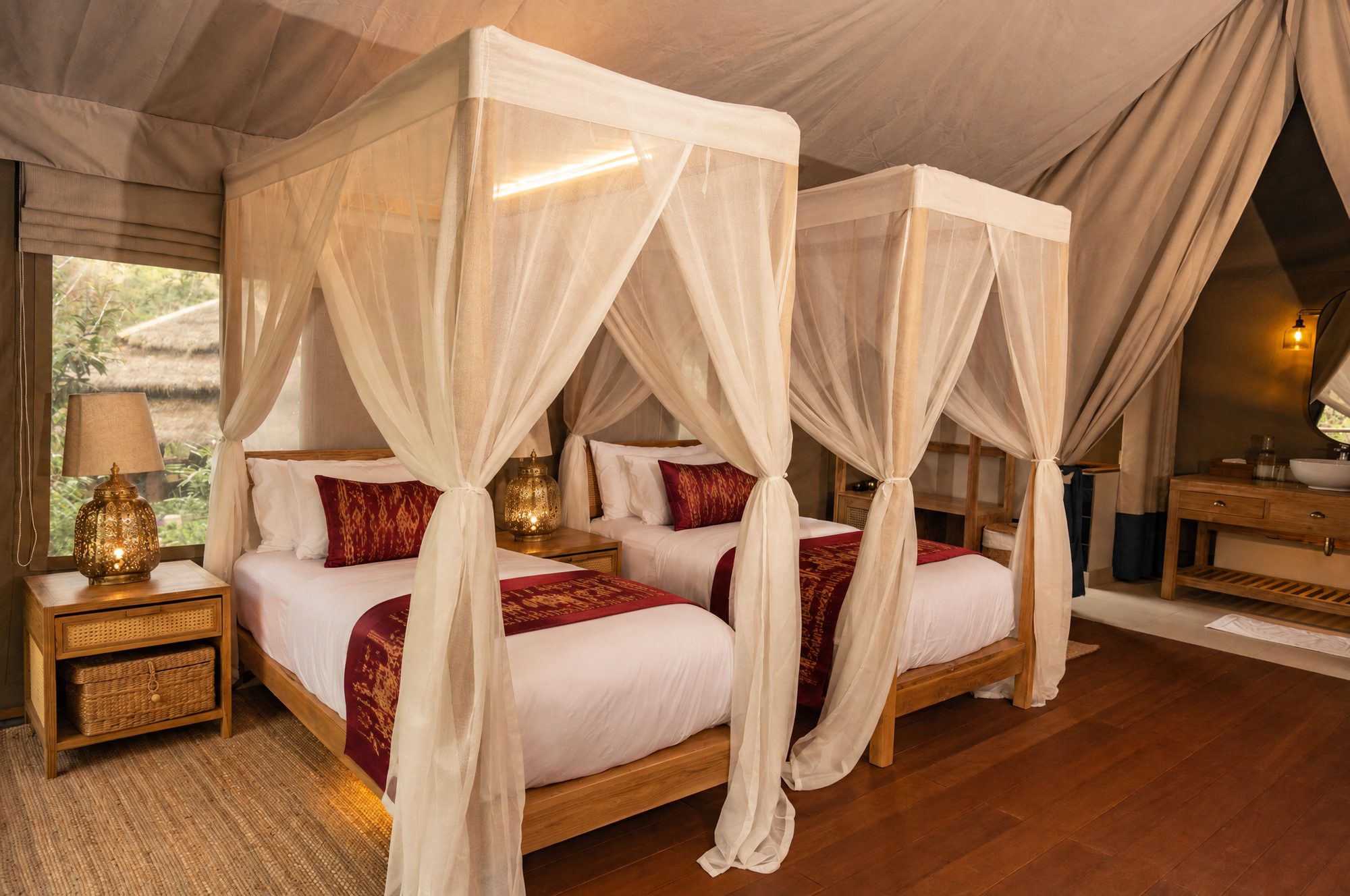 A tent set up with twin beds