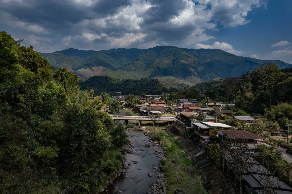 Ban Wen village and the creek winding through the Nan valley, seen from above
